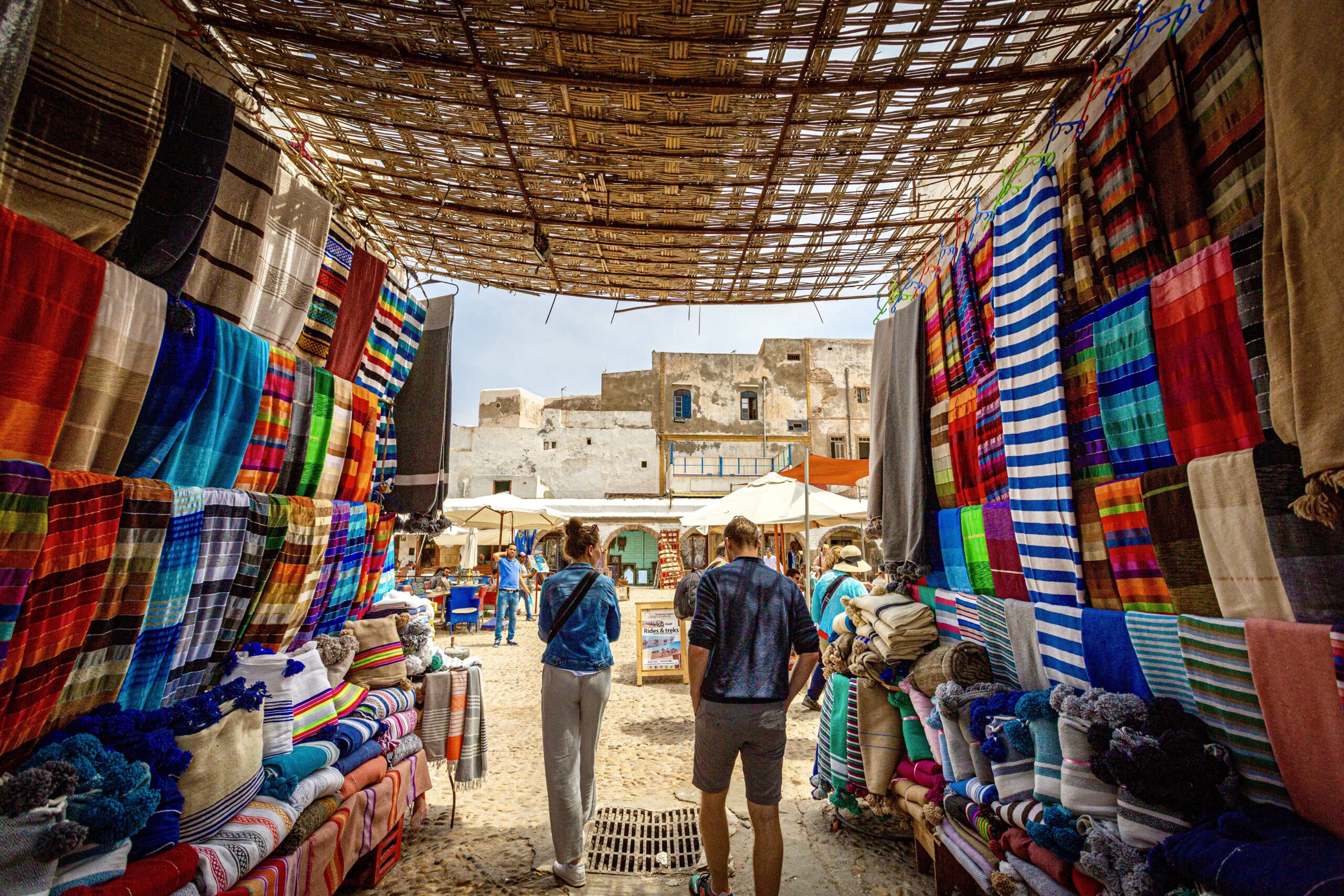 tourists-walking-through-moroccan-market-of-colour-2024-11-25-20-56-07-utc